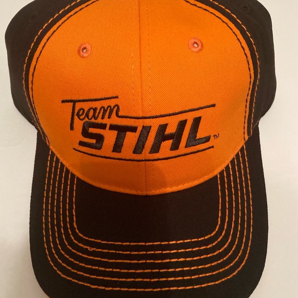 Brand new Stihl caps (3 available). Neon orange and black.